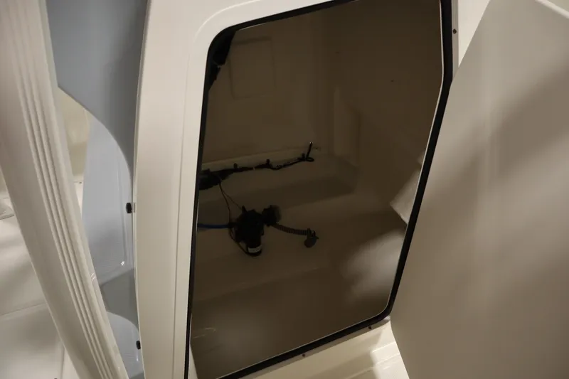 Slide: The Image of Interior view of 2026 Bayliner 20 Cc Trophy boat storage compartment. - 17