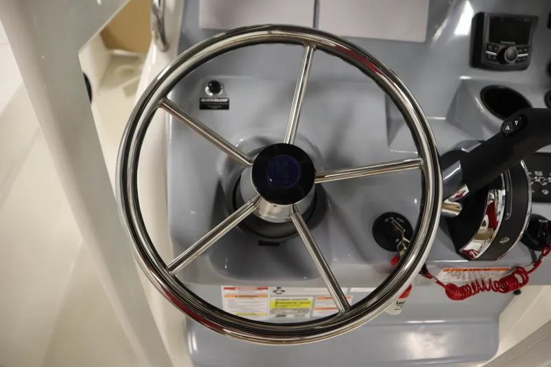 Slide: The Image of Steering wheel and controls of 2026 Bayliner 20 Cc Trophy boat. - 22