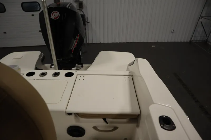 Slide: The Image of 2026 Bayliner 20 Cc Trophy boat interior with engine and seating area. - 28