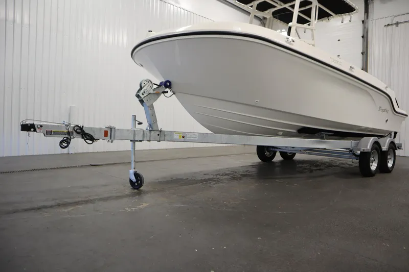 Slide: The Image of 2026 Bayliner 20 Cc Trophy boat on trailer in indoor storage facility. - 40