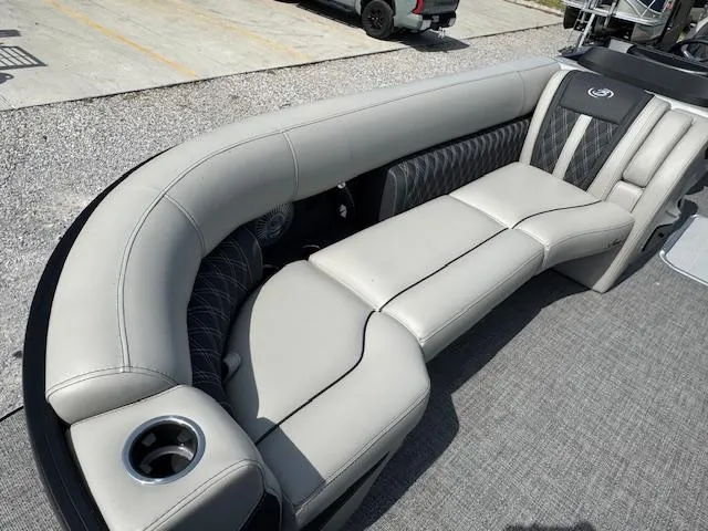 Slide: The Image of Luxurious 2026 Barletta LUSSO 25 UCA boat interior with plush seating and modern design. - 15