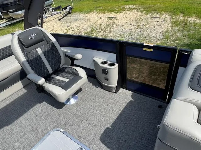 Slide: The Image of Captain's seat of 2026 Barletta LUSSO 25 UCA pontoon boat, featuring modern design and controls. - 17