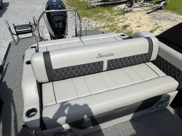 Slide: The Image of 2026 Barletta LUSSO 25 UCA pontoon boat with luxurious seating and sleek design. - 22