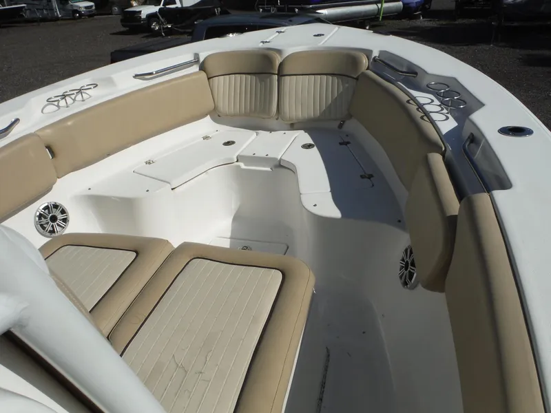 Slide: The Image of 2017 Sea Fox 266 Commander boat interior with beige seating and stainless steel accents. - 11