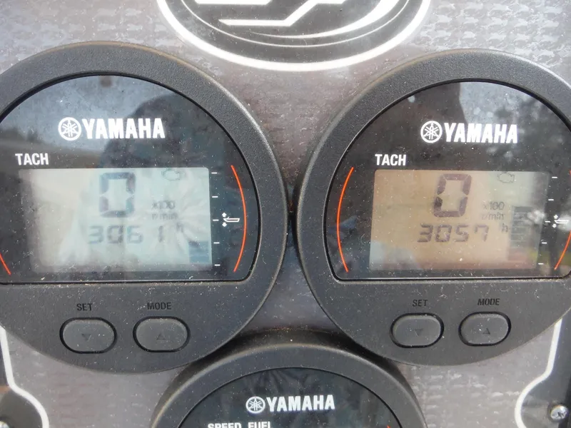Slide: The Image of Yamaha tachometers on 2017 Sea Fox 266 Commander boat dashboard, displaying engine hours. - 20