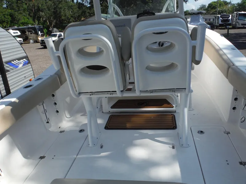 Slide: The Image of 2017 Sea Fox 266 Commander boat interior with seating and deck view. - 26