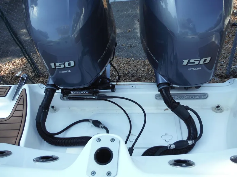 Slide: The Image of Twin Yamaha 150 engines on a 2017 Sea Fox 266 Commander boat. - 27