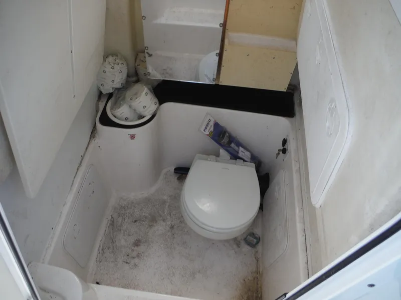 Slide: The Image of 2017 Sea Fox 266 Commander boat interior with toilet and storage space. - 28