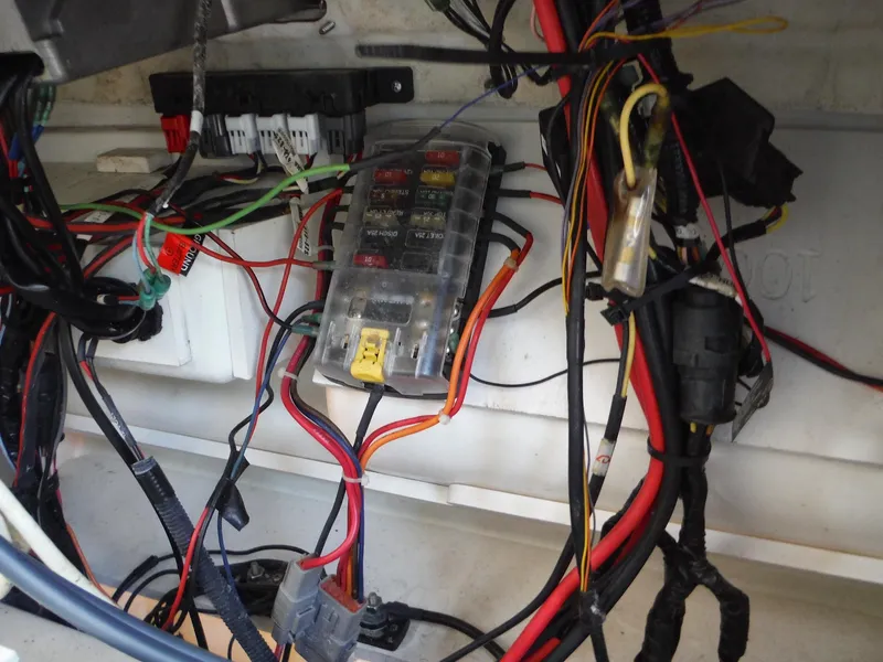 Slide: The Image of Electrical wiring and fuse box inside a 2017 Sea Fox 266 Commander boat. - 29
