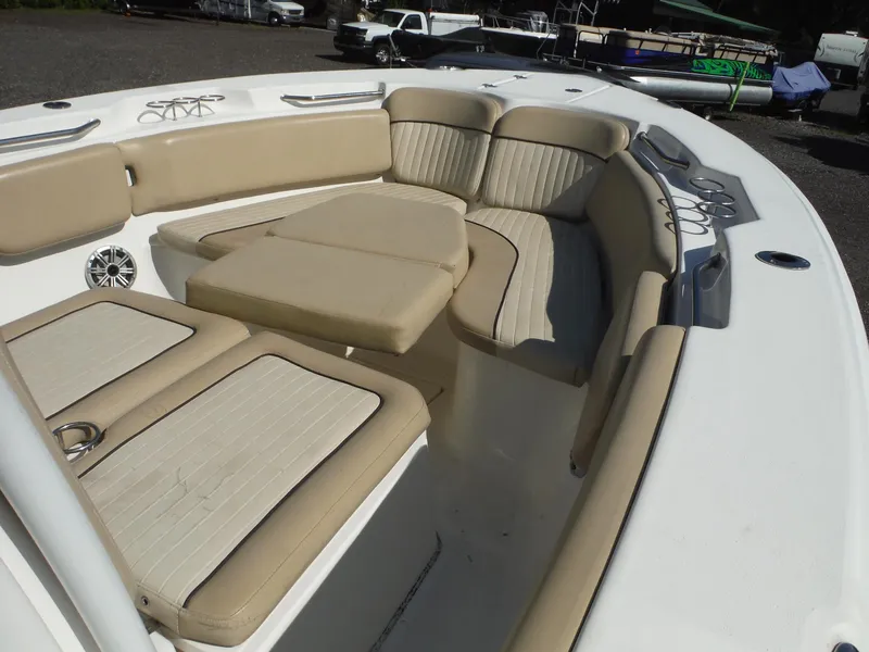 Slide: The Image of 2017 Sea Fox 266 Commander boat interior with beige cushioned seating. - 31