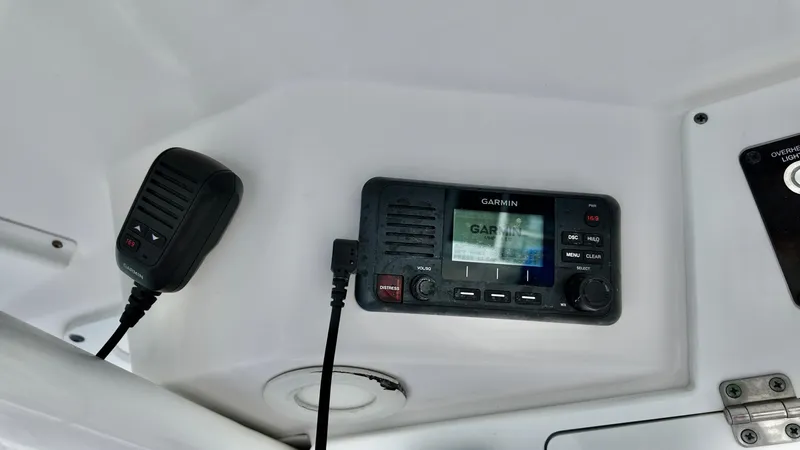 Slide: The Image of Garmin marine radio and microphone on 2023 Sea Fox 268 Commander boat. - 5