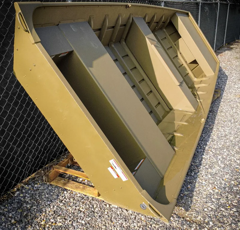 Slide: The Image of 2025 G3 Gator Tough 1648 LW boat on trailer, parked outdoors. - 4