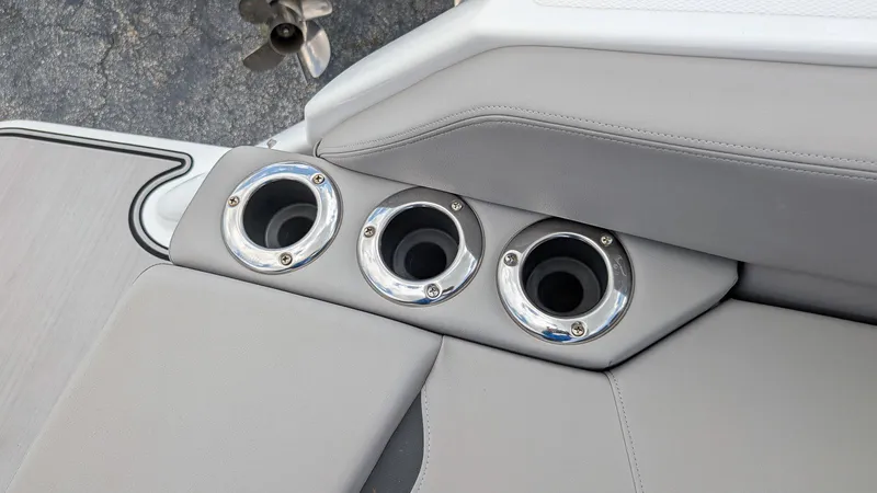 Slide: The Image of 2024 Four Winns HD8 OB boat with three stainless steel cup holders. - 11