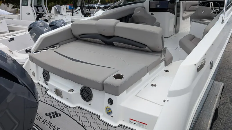 Slide: The Image of 2024 Four Winns HD8 OB boat with spacious seating and modern design. - 7