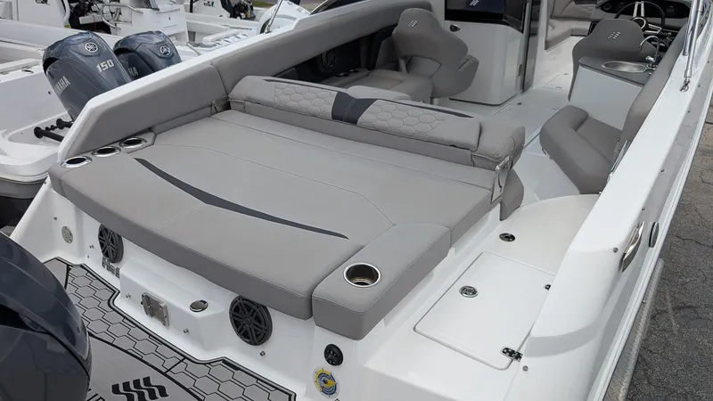 Slide: The Image of 2024 Four Winns HD8 OB boat interior with spacious seating and modern design. - 9