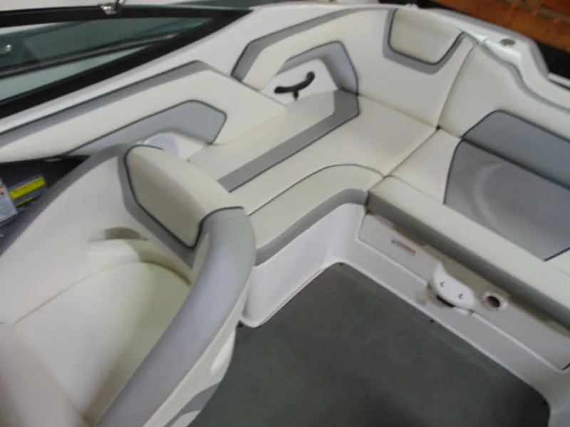 Slide: The Image of 2017 Yamaha SX190 boat interior with white and gray seating. - 10