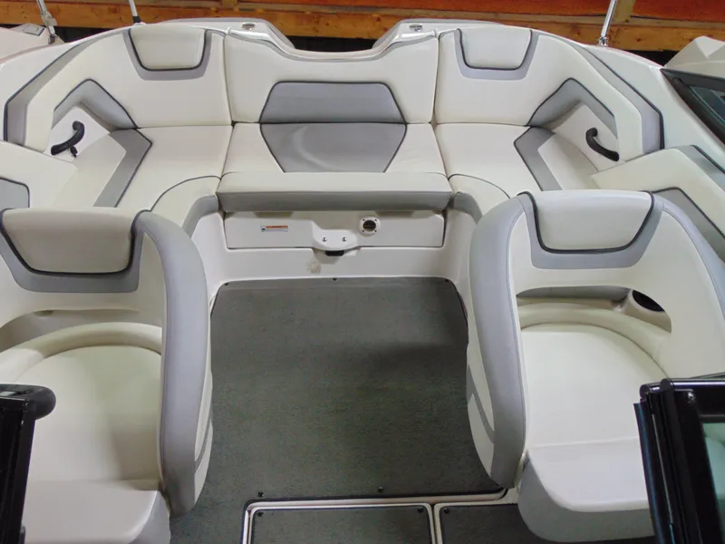 Slide: The Image of 2017 Yamaha Boats SX190 interior with white and gray seating arrangement. - 8
