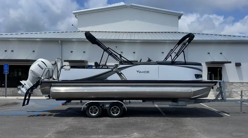 The Image of 2025 Tahoe LTZ VRB 23T DX pontoon boat on trailer. - 1