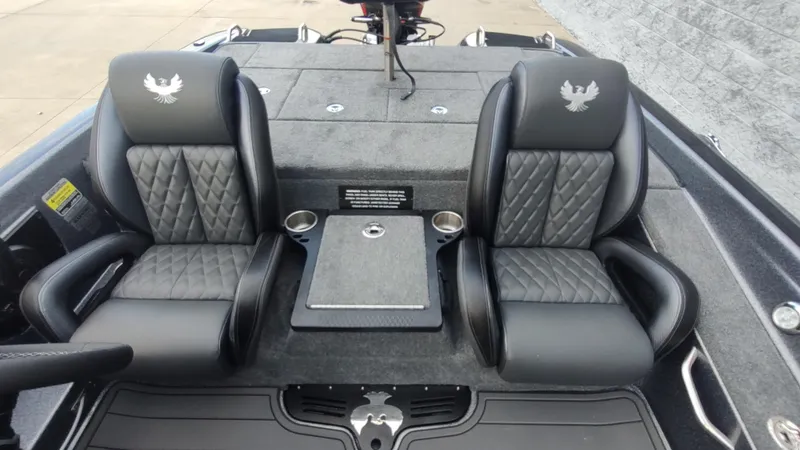 Slide: The Image of Luxurious seating in the 2026 Phoenix 919 ZXL boat, featuring quilted leather and cup holders. - 6