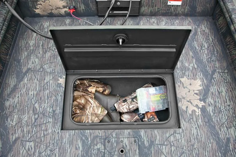 Slide: The Image of Manufacturer Provided Image: 2012 Crestliner 16 Ambush storage compartment with hunting gear. - 3