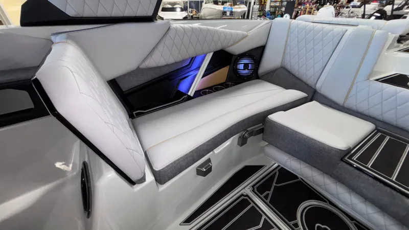 Slide: The Image of 2026 Tigé Z3 boat interior with luxurious seating and modern design. - 12