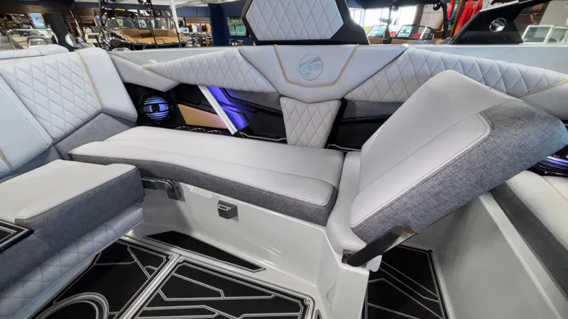 Slide: The Image of 2026 Tigé Z3 boat interior with luxurious seating and modern design. - 14