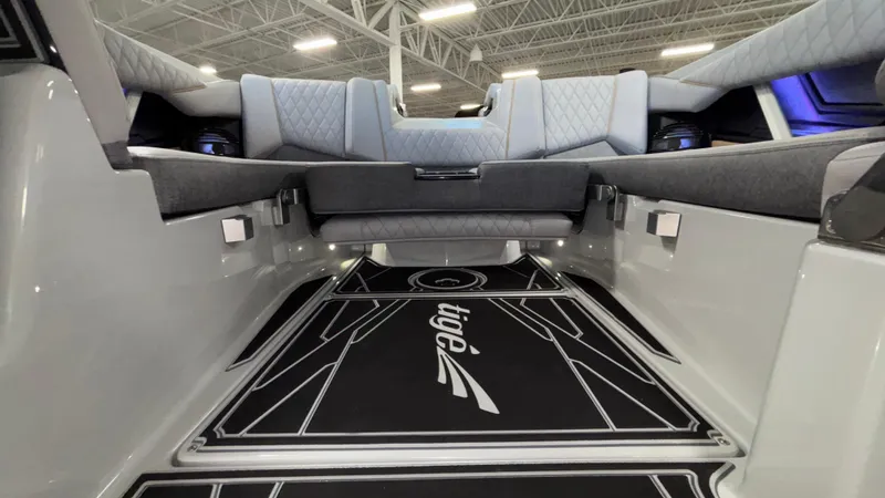 Slide: The Image of 2026 Tigé Z3 boat interior with modern seating and stylish flooring design. - 15