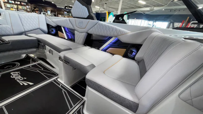 Slide: The Image of Luxurious interior of 2026 Tigé Z3 boat with plush seating and modern design. - 16