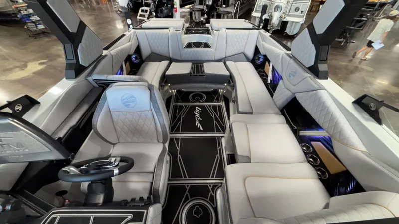 Slide: The Image of Luxurious interior of 2026 Tigé Z3 boat with plush seating and modern design. - 17