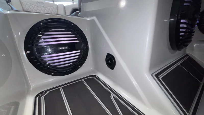 Slide: The Image of 2026 Tigé Z3 boat interior with sleek speaker system and modern design. - 22