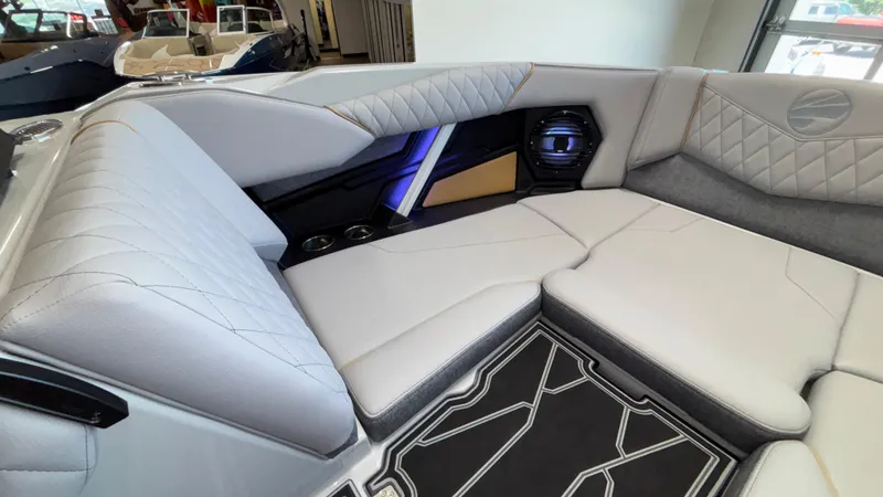 Slide: The Image of Luxurious interior of 2026 Tigé Z3 boat with plush seating and modern design. - 26