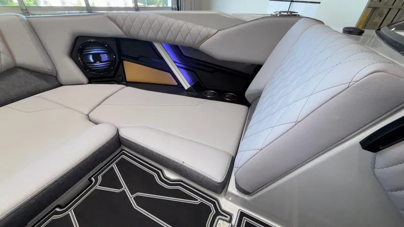 Slide: The Image of 2026 Tigé Z3 boat interior with luxurious seating, speaker, and modern design elements. - 28