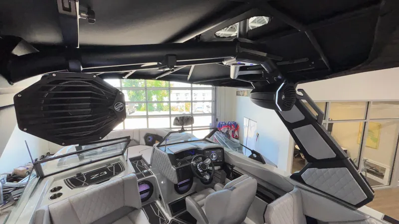 Slide: The Image of 2026 Tigé Z3 boat interior with modern dashboard and premium seating. - 45