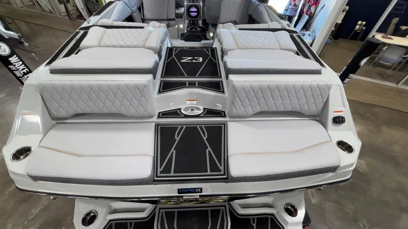 Slide: The Image of 2026 Tigé Z3 boat interior with luxurious seating and modern design. - 5