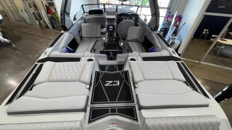 Slide: The Image of 2026 Tigé Z3 boat interior with luxurious seating and modern design. - 7