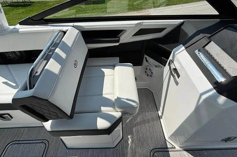 Slide: The Image of 2026 Cobalt R6 Outboard interior with modern seating and sleek design. - 14
