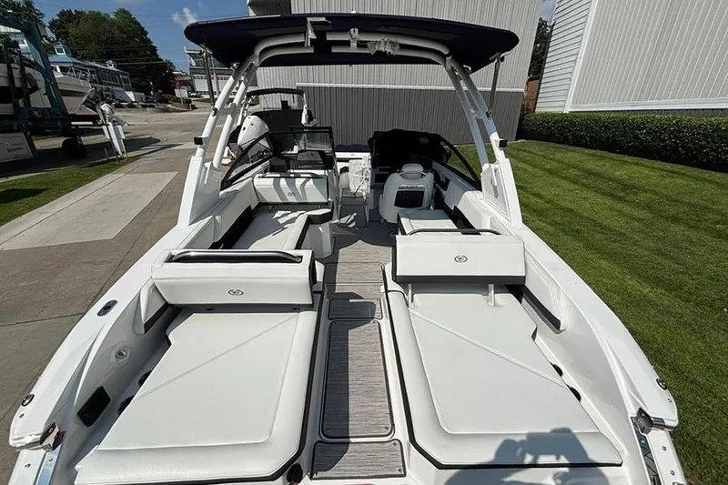 Slide: The Image of 2026 Cobalt R6 Outboard boat interior with white seating and modern design. - 7