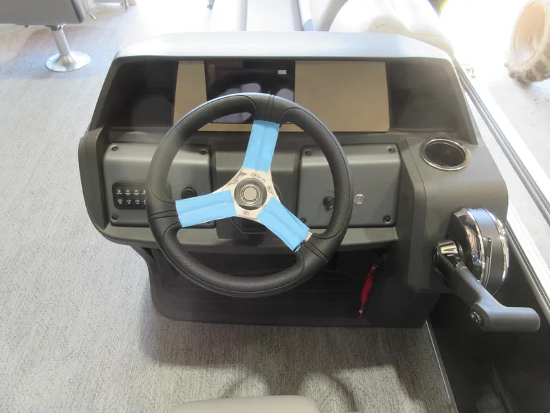 Slide: The Image of Steering console of 2026 Sun Tracker SportFish 20 DLX pontoon boat. - 6