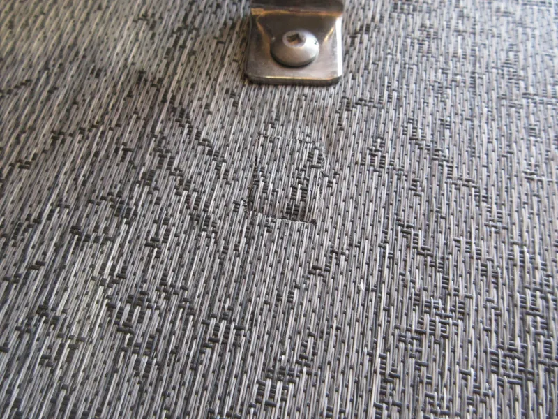 Slide: The Image of Close-up of textured flooring on a 2026 Sun Tracker SportFish 20 DLX boat. - 7