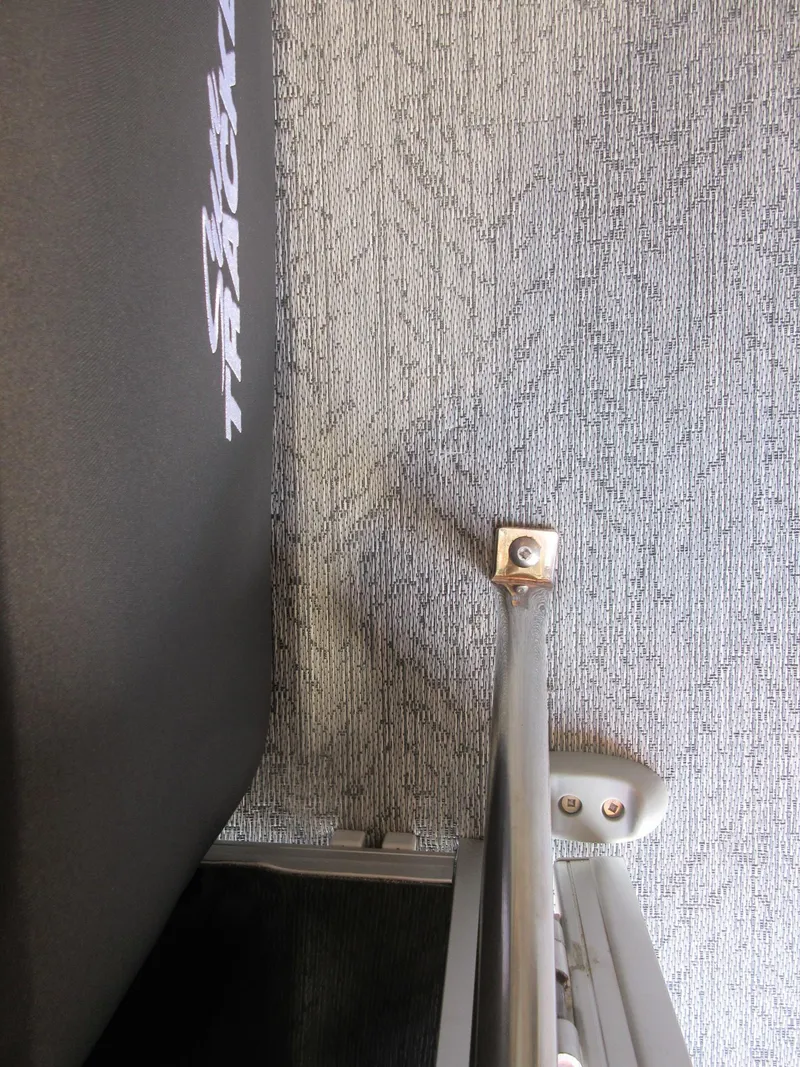 Slide: The Image of 2026 Sun Tracker SportFish 20 DLX boat interior with railing and seat detail. - 9