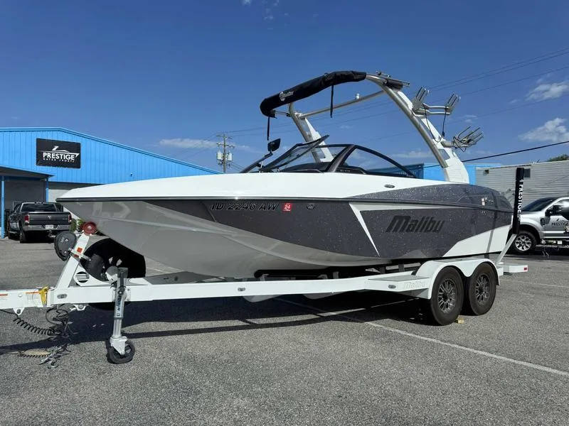 Slide: The Image of 2017 Malibu Wakesetter 20 VTX boat on trailer, parked outside dealership. - 3