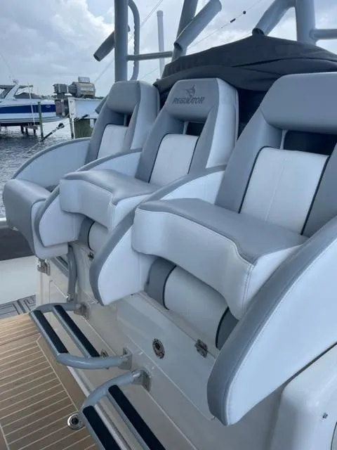 Slide: The Image of Luxury seating on a 2018 Regulator 41 boat, featuring sleek design and comfort. - 13