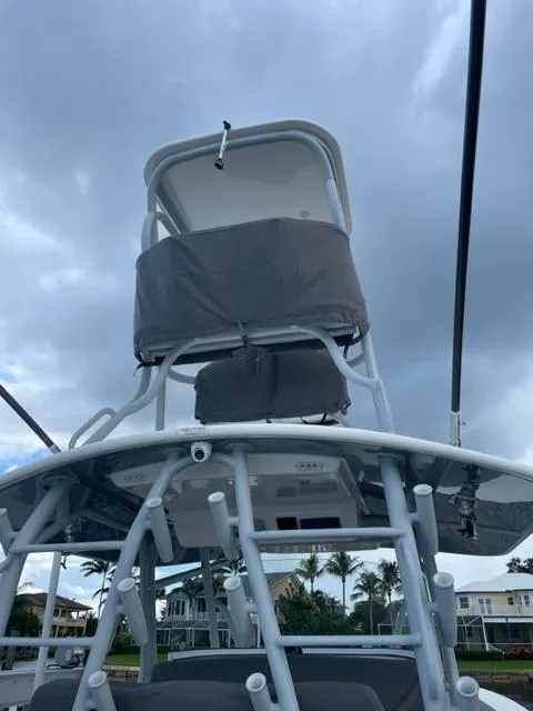 Slide: The Image of 2018 Regulator 41 boat with tower against cloudy sky backdrop. - 15