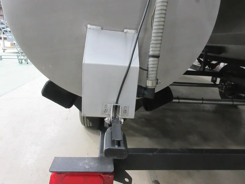 Slide: The Image of 2024 Sun Tracker Fishin' Barge 20 DLX trailer hitch and rear detail. - 7