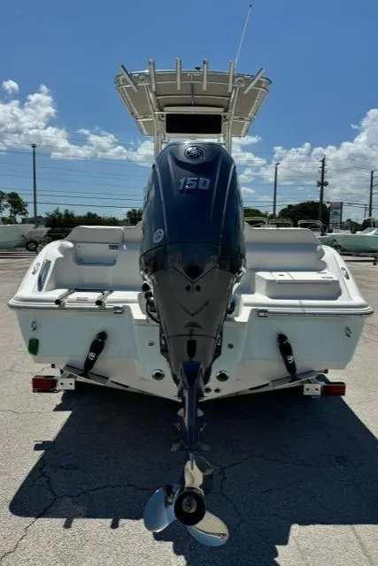 Slide: The Image of 2026 Key West 219 FS boat with powerful 150 HP outboard motor, rear view. - 7