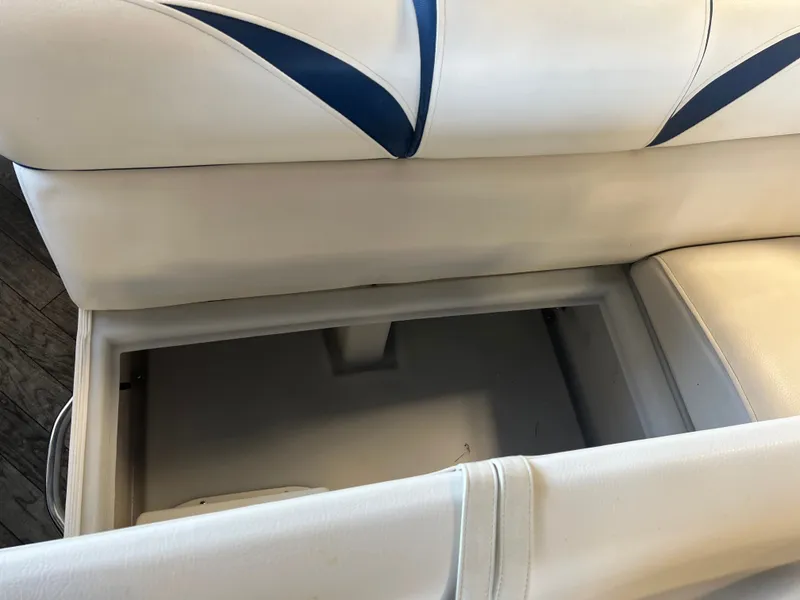 Slide: The Image of Open storage compartment in 2018 Berkshire 23 CLSTS2.75 boat seat. - 11