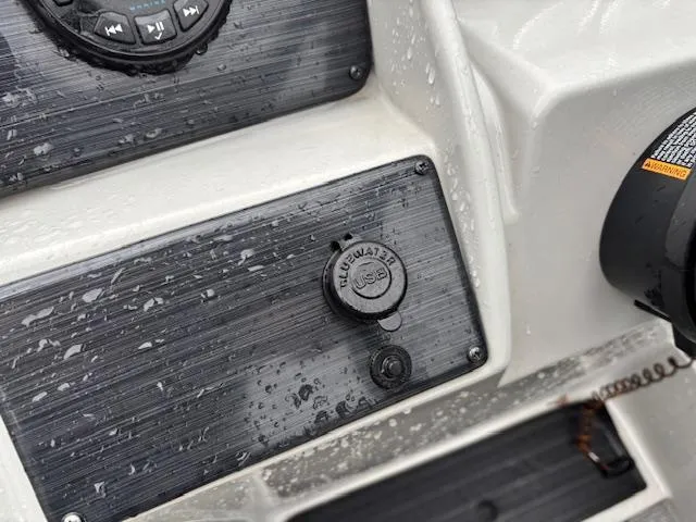 Slide: The Image of Dashboard of 2021 Sylvan Mirage 820 Cruise with USB port and controls. - 22