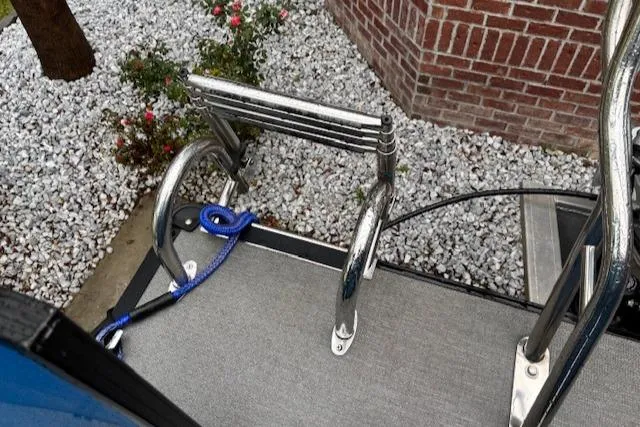 Slide: The Image of Stainless steel boat ladder on a 2021 Sylvan Mirage 820 Cruise. - 25