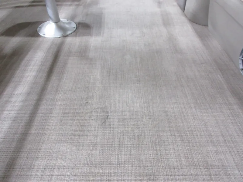 Slide: The Image of 2024 Sun Tracker SportFish 20 DLX interior flooring with metal base. - 13