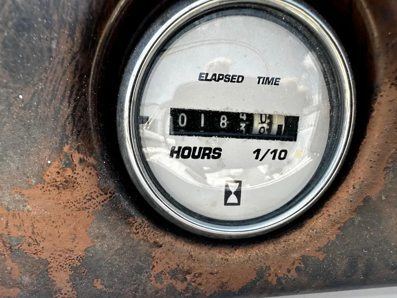 Slide: The Image of Hour meter showing 1840.1 hours on 2002 Godfrey Hurricane SD187. - 5